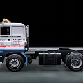 DAF Cab Truck With Yellow Warning Lights And Red White Blue Stripes Moving On Road