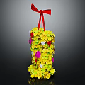 Decorative Plant Arrangement With Yellow Leaves Colorful Flowers And Red Bow On Top