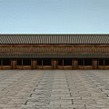 Ancient Chinese Architecture Featuring Traditional Roof Wooden Structure and Stone Paved Courtyard