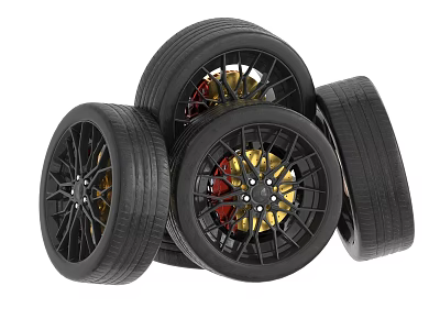 Car Tires with Black Gold Red Alloy Rims Stacked on White Background 3d model