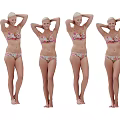 Woman Standing In Floral Bikini Posing With Hands Behind Head
