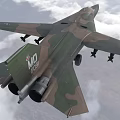 Military Camouflage Fighter Jet Flying Through Clouds With Weapon Pylons