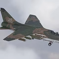 Military Fighter Jet Flying In Sky With Armaments
