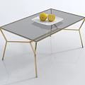 Modern Coffee Table With Glass Top And Gold Metal Legs Featuring White Tray With Lemons
