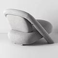 Modern Gray Lounge Chair with Curved Arms Unique Legs and Upholstered Fabric Design