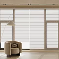 Light Colored Venetian Blinds on Large Window with Armchair and Floor Lamp in Modern Interior
