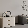 Modern Light And Dark Bedside Tables With Mirrors Plant And Decorative Items