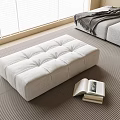 Tufted Light Gray Ottoman with Open Book and Books on Rug Near Sofa and Window