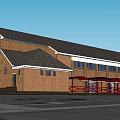 Brick Office Building With Black Roof Multiple Windows And Red Canopy