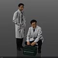 Two Doctors In White Coats Standing And Kneeling With Green Medical Bag