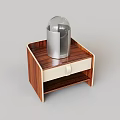 Wooden Nightstand With White Drawer And Silver Container With Transparent Cover
