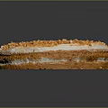 Round Layered Cake With Golden Crumbles And Cream Filling On Dark Background