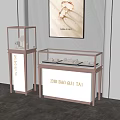 Elegant Jewelry Display Shelves With Glass Cases And Gold Lettering On Striped Wall