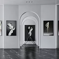 Modern Interior With White Walls Black White Artworks Arched Doorway Black Sculpture Dark Marble Floor