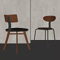 Modern Leisure Chairs with Wooden Back Metal Frame and Black Brown Cushions in Minimalist Interior