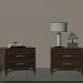 Modern Dark Brown Wooden Bedside Tables With Metal Handles Drawers Books Lamp And Small Plant