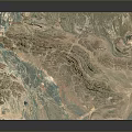Stunning Aerial View Of Mountainous Terrain With Winding Rivers And Colorful Landforms
