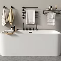 Modern White Freestanding Bathtub in Minimalist Bathroom with Towel Rack and Bath Products