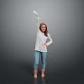 Woman Wearing White Top Blue Jeans Brown Boots Raising Right Hand Against Gray Background