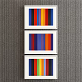 Three Framed Colorful Vertical Stripe Paintings With White Frames On Gray Wall