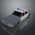 Vintage Police Car With Blue Red Emergency Lights And Side Badge On Gray Body