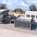 Two Story Container Building With Black White Exterior Large Windows And Balcony