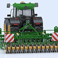Green Agricultural Tractor With Attached Farming Implements For Efficient Agricultural Operations