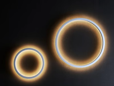 Two Modern Round Wall Lamps with Warm Yellow Light on Black Background 3d model