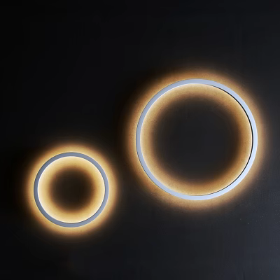 Two Modern Round Wall Lamps with Warm Yellow Light on Black Background 3d model