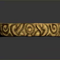 Golden Decorative Ring With Intricate Carved Patterns And Shiny Surface