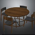 Round Wooden Dining Table With Four Chairs Gray Padded Seats And Wooden Frame