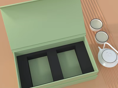 Open Green Box With Black Compartments And White Teacups Teapot On Striped Tabletop 3d model