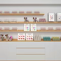 Organized Stationery Display On Wooden Shelves With Colorful Pens Notebooks And Signs