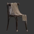 Vintage Wooden Leisure Chair With Beige Cloth Draped And Natural Wood Texture