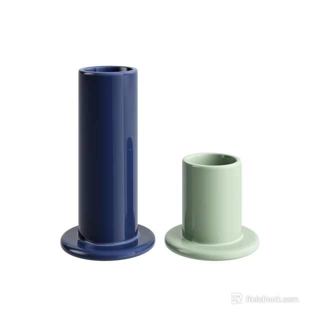 Two Modern Cylindrical Decorative Objects Dark Blue And Light Green With Round Base 3d model