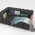 Multi Person Black Sofa With Colorful Pillows And Patterned Blanket Design