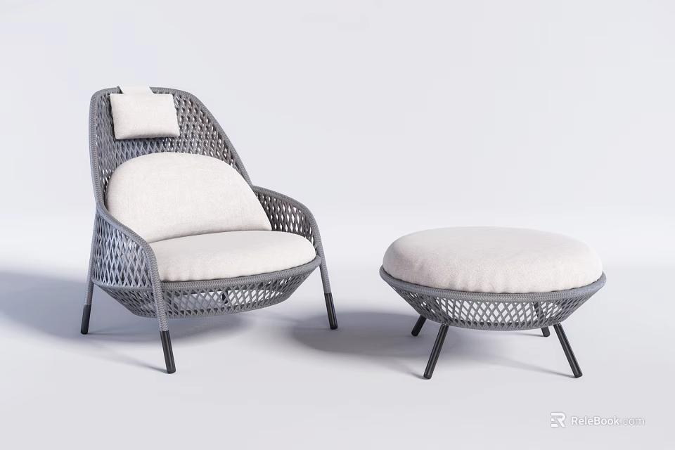 Elegant Rattan Leisure Chair with White Cushion and Matching Ottoman 3d model 