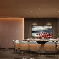 Stylish Private Dining Room Interior With Round Dining Table Floral Arrangement And Curtains