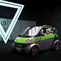 Green And Gray Compact Two Seater Car With Transparent Roof And White Triangle Neon Light