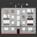 Multistory Apartment Building With Gray Brick Exterior Windows Balconies Red Door Graffiti And Antennas
