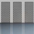 Three Hinged Doors With Geometric Patterns On White Wall And Smooth Floor Reflections