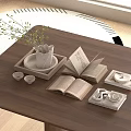Decorative Accessories Set with White Vase Green Foliage Open Books Teacups on Wooden Coffee Table