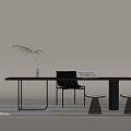Modern Black Desk With Silver Legs Clear Vase Green Plant Laptop Black Chair Blue Stools