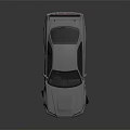 Silver Modified Sports Car With Rear Spoiler And Sleek Exterior Design