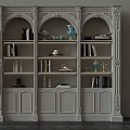 Ornate White Decorative Cabinet with Carved Classical Design Shelves Holding Books Vases and Decorative Items