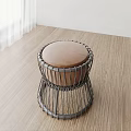 Modern Wire Woven Metal Frame Stool With Brown Padded Seat In Interior