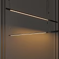 Modern Linear Pendant Lights With Warm Glow In Contemporary Interior Space