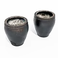 Pair of Handcrafted Black Ceramic Jars With Textured Surface And Matte Finish