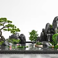 Natural Rockery Stones with Pine Tree Small Waterfall and Water Lilies in Garden Pond