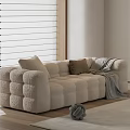 Beige Plush Double Sofa With Tufted Design Throw Pillows Blanket And Light Rug